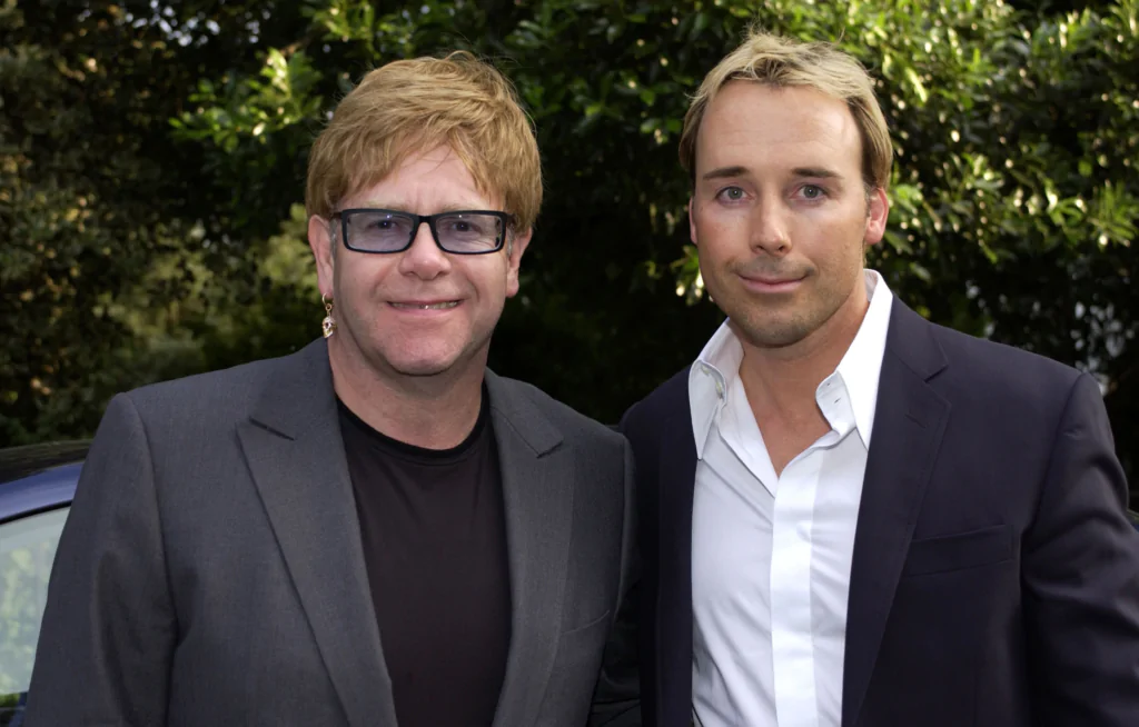 Elton John and David Furnish with Lev